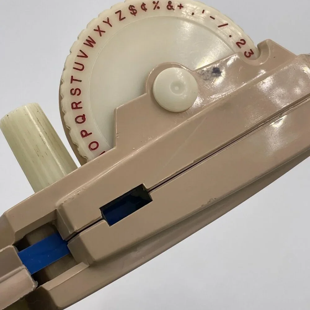 Vintage DYMO Label Maker Beige Tan With Partial Blue Roll Tape